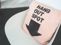 kaboompics.com_Pillow with sentence Hang Out Spot